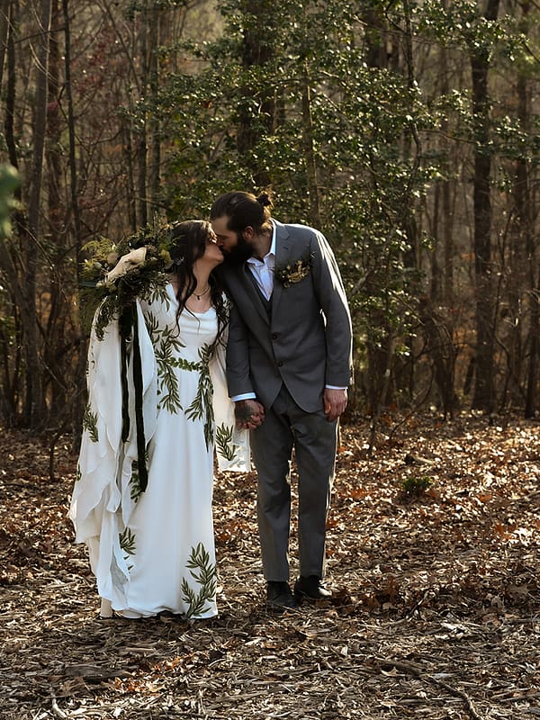 Shaina and Dustin walking together in a North Georgia forest — Juliette Chapel wedding